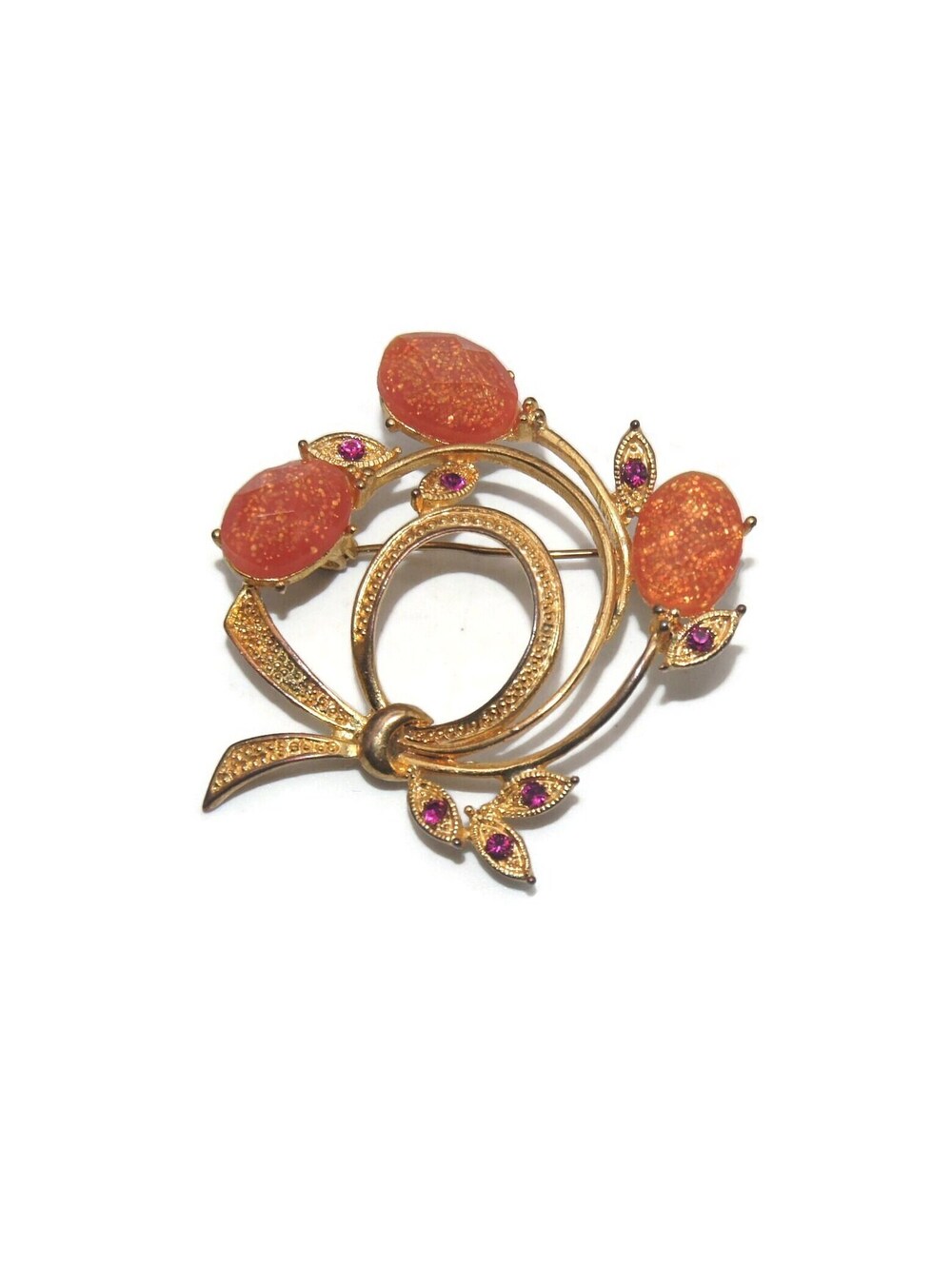 Vintage Gold Tone, Faceted Orange Glittered Plastic and Pink Rhinestones Brooch.